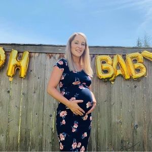 Knee length maternity dress.